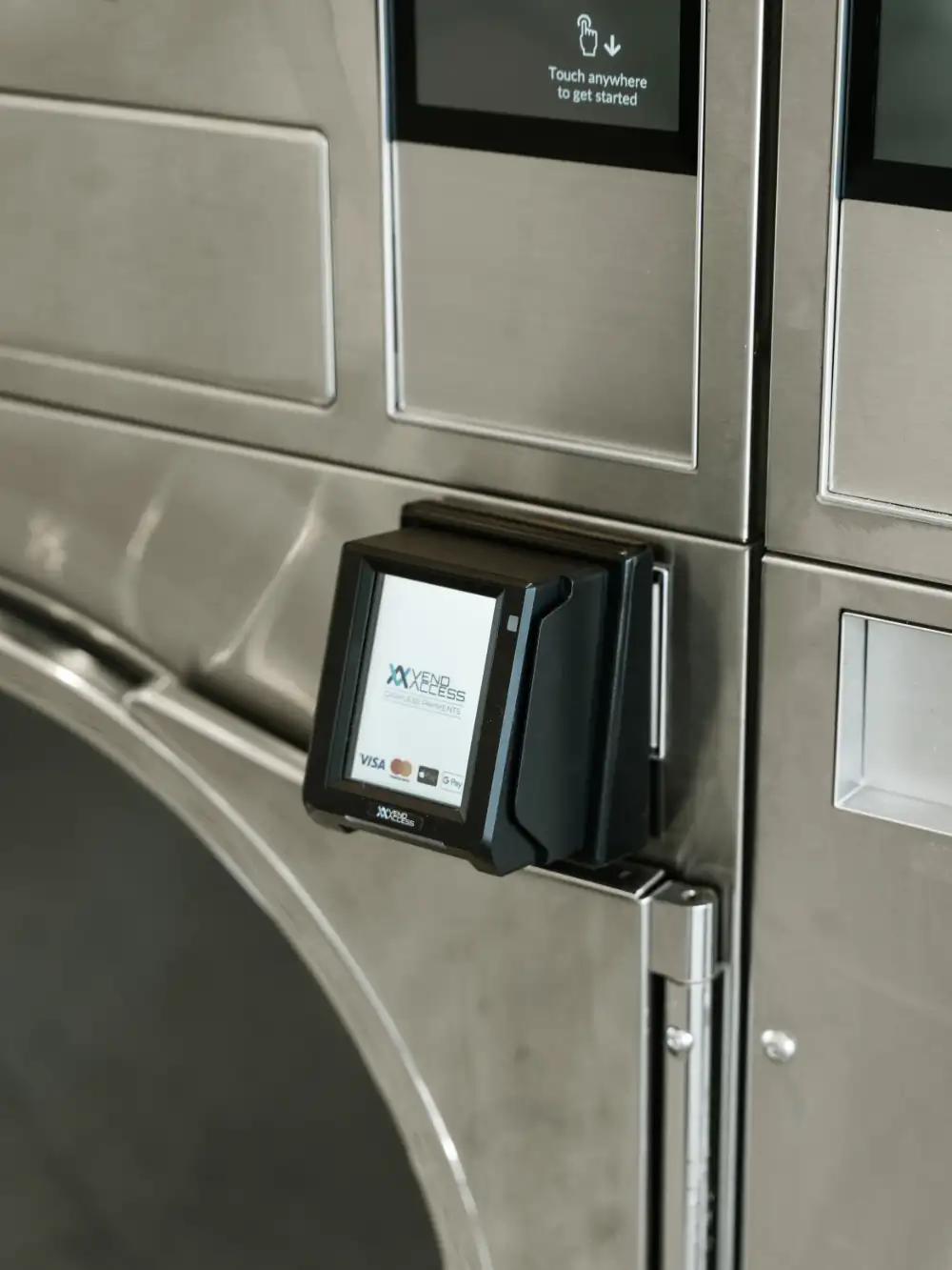 Tap-to-pay reader on a Speed Queen machine at Fresh Lab Laundromats, Maylands — pay and save with the Speed Queen app